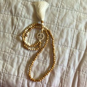 Boho 24” peace sign necklace.